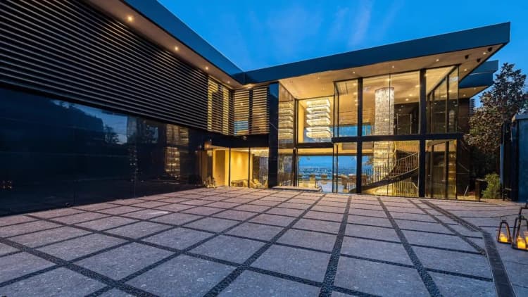Courtyard of a modern property at dusk